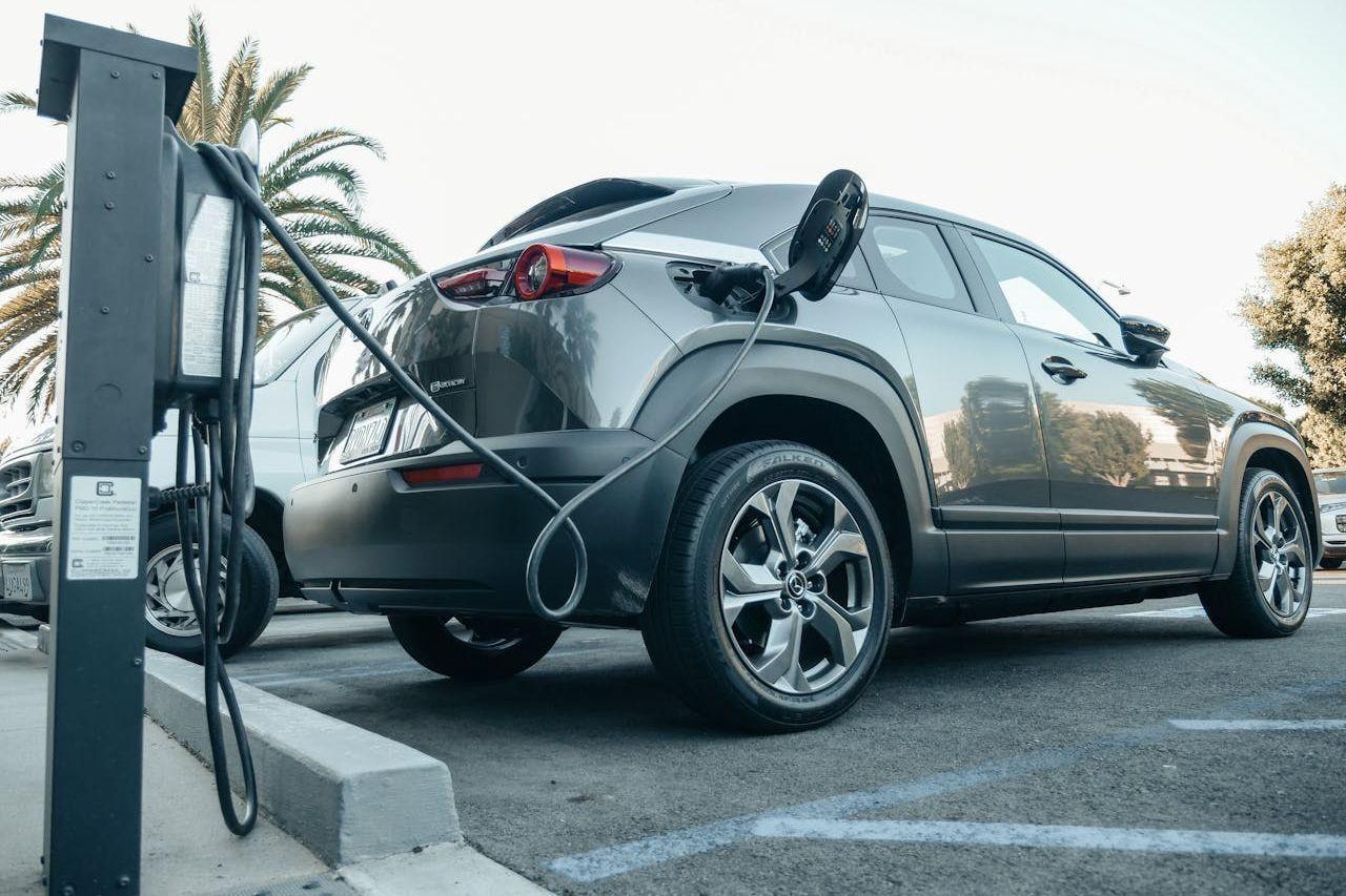 Electric car parked at a charging bay