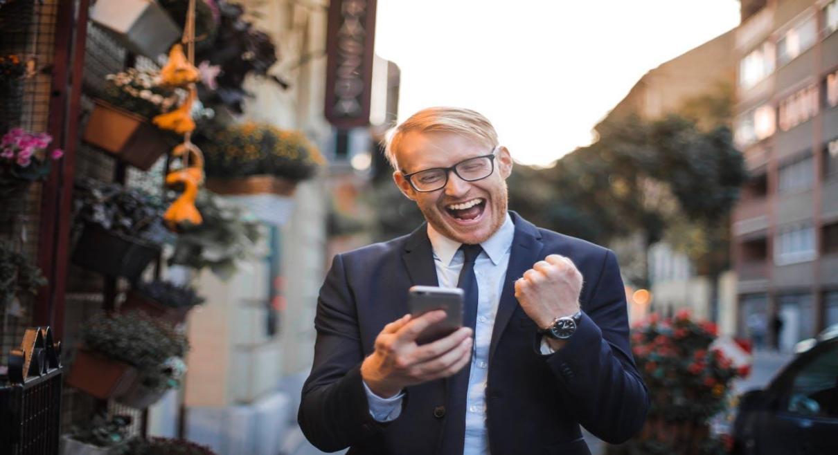 man looking at his smartphone